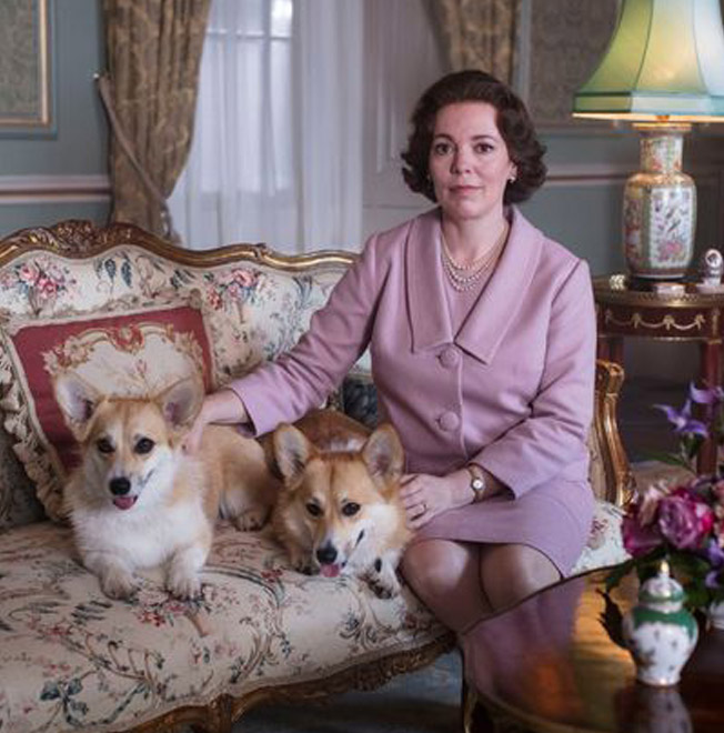 Olivia Coleman with famous royal corgis on The Crown